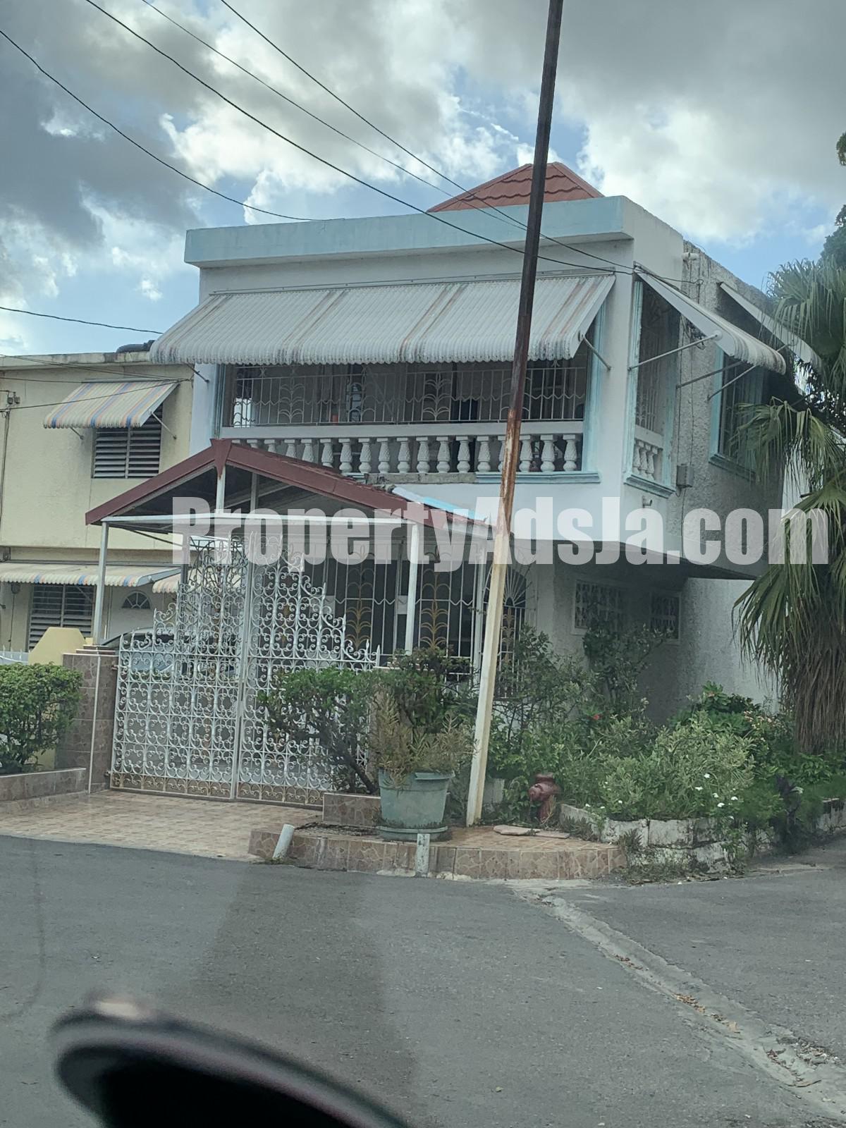 Townhouse For Sale in Cooreville Garden Waillers Drive, Kingston / St