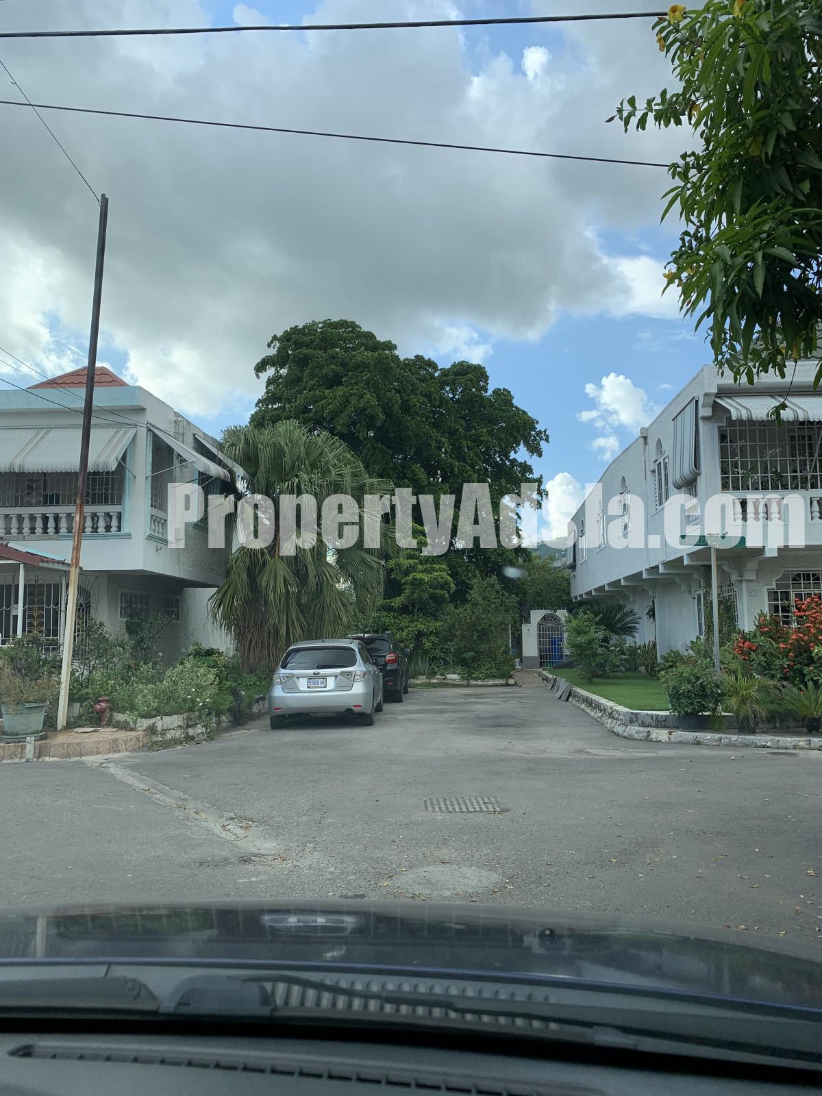 Townhouse For Sale in Cooreville Garden Waillers Drive, Kingston / St